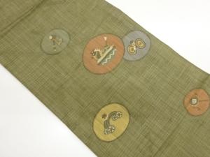 丸文に玩具模様織出し名古屋帯